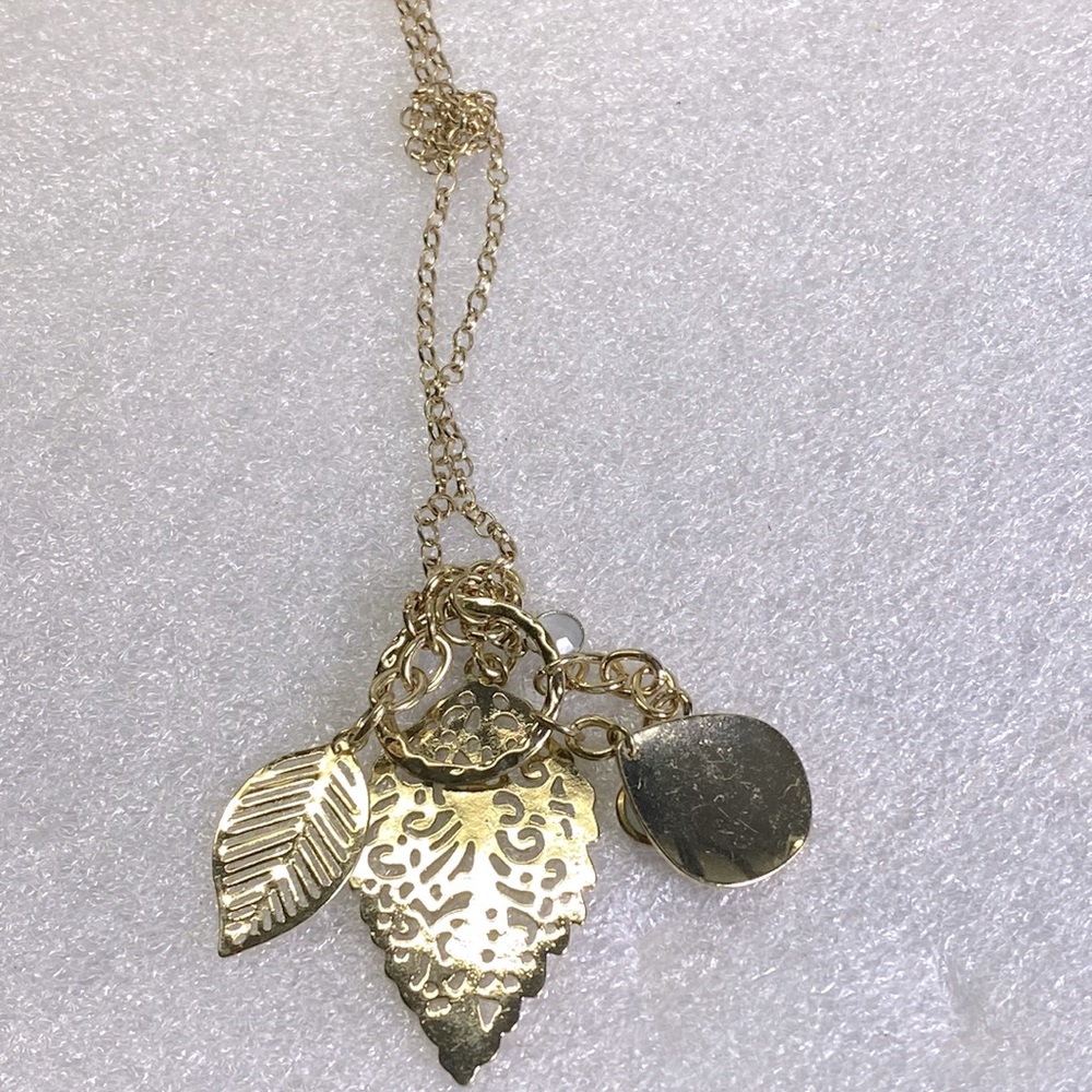 Gold tone leaf necklace